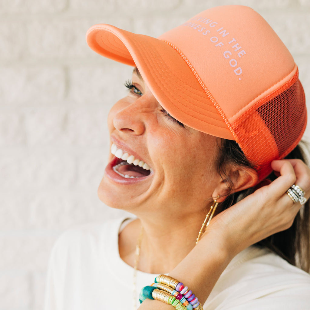 "Living in the Goodness of God" Coral Trucker Hat